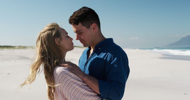 Romantic Couple Embracing on a Sunny Beach - Download Free Stock Images Pikwizard.com