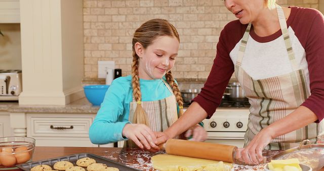 Mother and Daughter Baking Together in Warm Home Kitchen - Download Free Stock Images Pikwizard.com