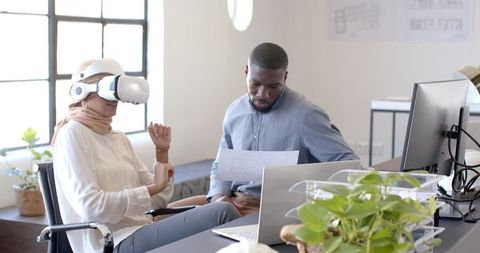 Innovative Office Team with VR Headset Collaboration