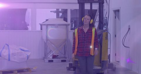 Warehouse Worker in Industrial Setting with Glowing Light Effect - Download Free Stock Images Pikwizard.com