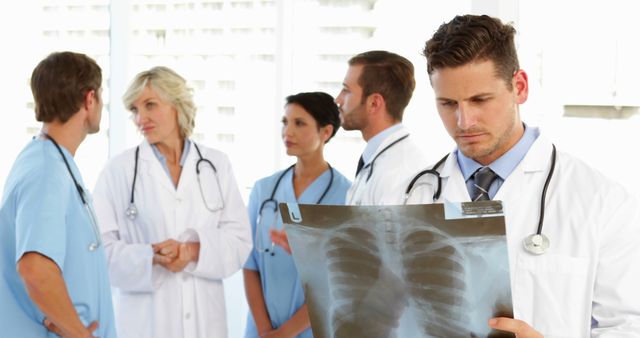 Medical Professionals Discussing X-ray Diagnosis - Download Free Stock Images Pikwizard.com