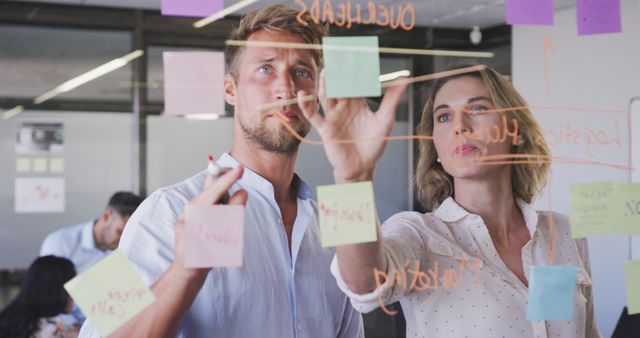 Business Professionals Collaborating in Modern Office on Glass Board - Download Free Stock Images Pikwizard.com