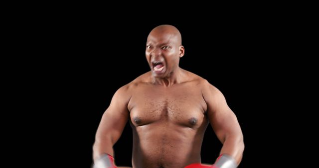 Angry african american strong man flexing muscles with copy space on black background. Boxing, strength, fitness concept.