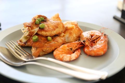 Grilled Salmon with Shrimp and Peas Served on Grey Plate