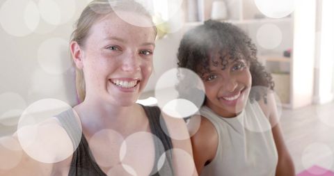 Diverse teenage girls embracing wellbeing at yoga class