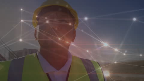 Engineer Overlaid with Digital Network Connections