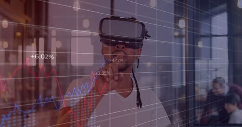 Man Exploring Virtual Financial Market with VR Headset - Download Free Stock Images Pikwizard.com
