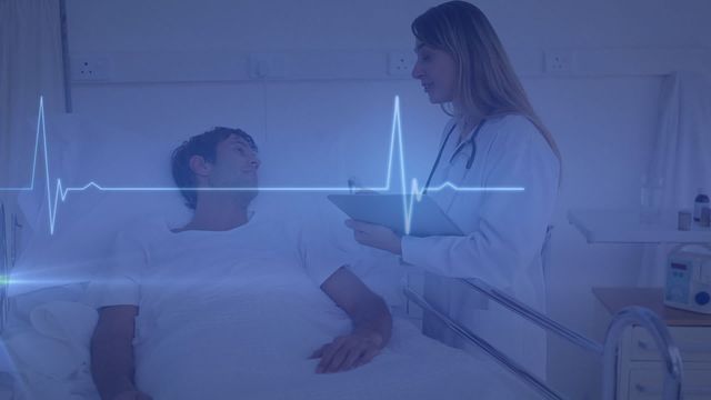 Caucasian female doctor talking to male patient in hospital room with heart rate monitor animation overlay. Useful for depicting modern healthcare, patient care, medical technology, and hospital environments.