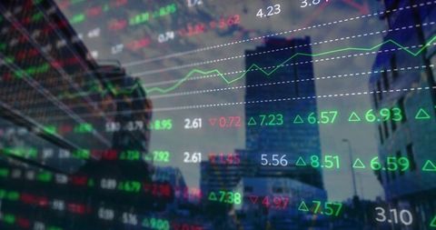 Stock market data overlay hovering over urban financial district skyline with tickers, graphs