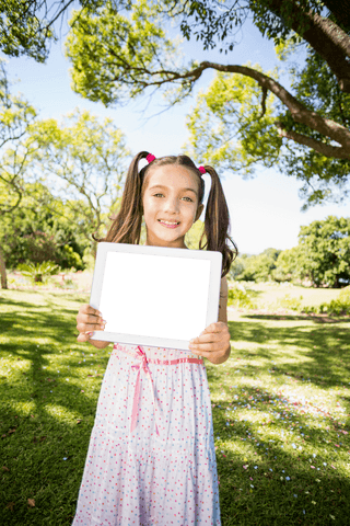 young girl smiling holding transparent digital tablet outdoors - Download Free Stock Videos Pikwizard.com