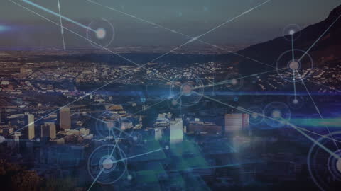 Digital Network Grid Overlay on Cityscape at Dusk