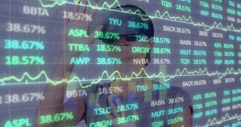 Businesswoman Analyzing Stocks with VR Technology for Trading Insights