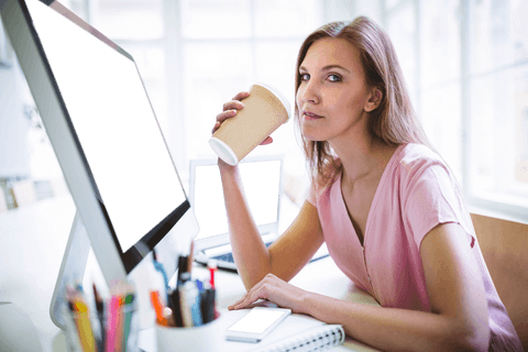 Businesswoman Holding Coffee Cup in Bright Office Transparent Screens - Download Free Stock Videos Pikwizard.com