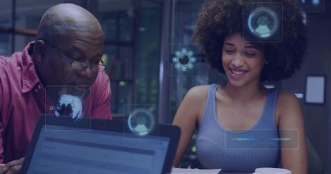 Diverse Team Collaborating with Innovative Digital Interface in Modern Office