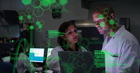 Researchers collaborating with augmented reality hexagonal hud on laptop in laboratory