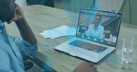 Virtual Business Meeting with Colleagues on Laptop