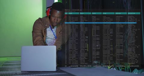IT Engineer Analyzing Data in Server Room with Laptop - Download Free Stock Images Pikwizard.com