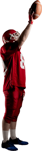 Young football player holding ball on transparent background