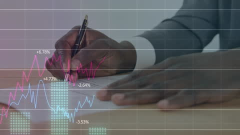 Businessman Taking Notes with Overlay of Financial Data Analysis