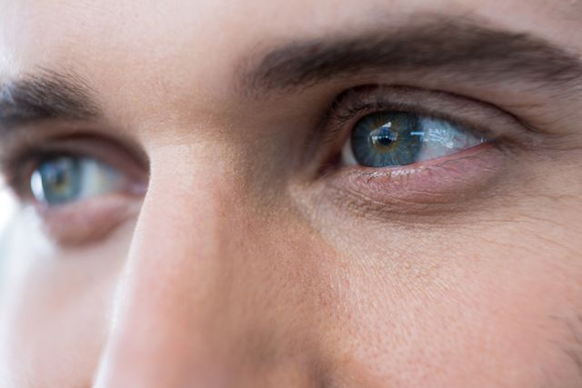 Close-Up of Man's Green Eyes - Download Free Stock Photos Pikwizard.com