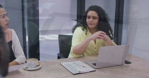 Diverse Female Students Discussing Financial Data Innovations