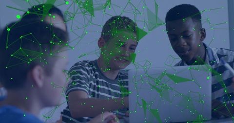 Teen Students Collaborating with Digital Technology in Classroom