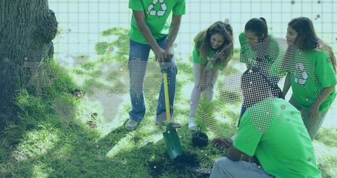 Eco-friendly Volunteers Planting Tree for Environmental Conservation