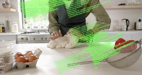 Home baker kneading dough on countertop with eggs and green digital code overlay