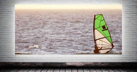 Windsurfer on Ocean Canvas Against Brick Wall Background