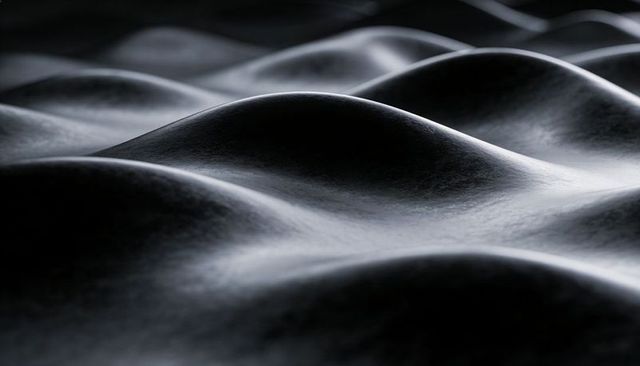 Undulating monochrome dome waves with smooth specular highlights and texture