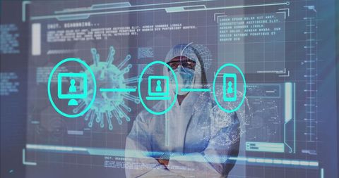 Scientist in ppe analyzing covid-19 data on digital screen