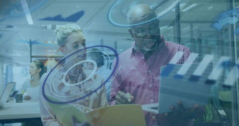 Business Professionals Analyzing Digital Data with Innovative Technology