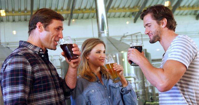 Friends Enjoying Refreshing Drinks in Brewery - Download Free Stock Images Pikwizard.com