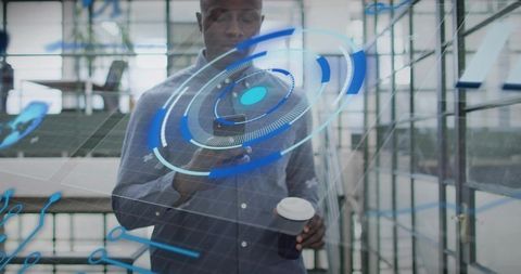 Man interacting with augmented reality HUD using smartphone and coffee in modern atrium