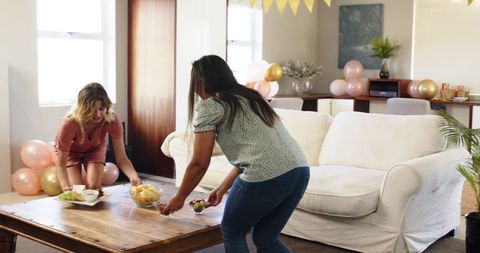 Multiracial Friends Preparing for Birthday Celebration at Home