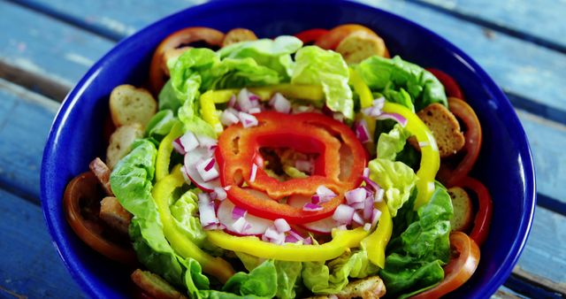 Fresh Mixed Vegetable Salad in Blue Bowl on Wooden Table - Download Free Stock Images Pikwizard.com