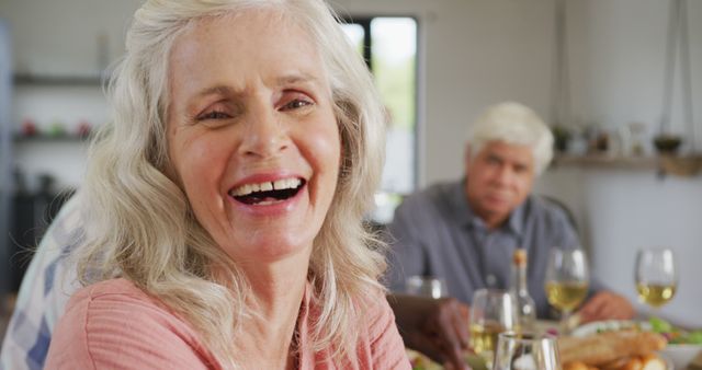 Joyful Senior Woman Enjoying Time with Family at Home - Download Free Stock Images Pikwizard.com