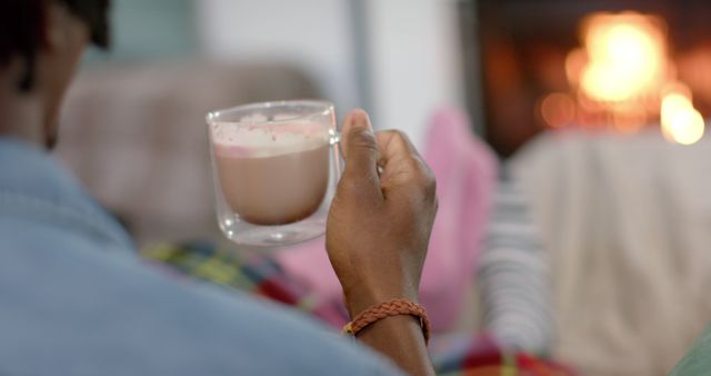 Relaxing by Fireplace with Hot Chocolate on Winter Evening - Download Free Stock Images Pikwizard.com