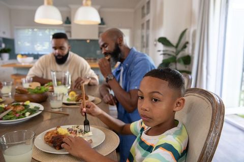 Family Enjoying Mealtime in Cozy Dining Room
