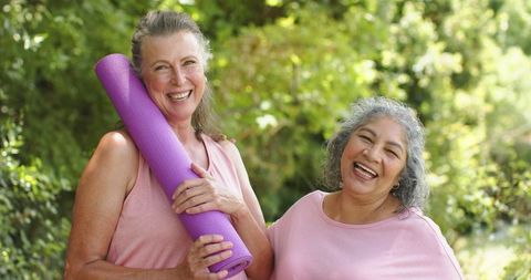 Senior Women Enjoying Outdoor Yoga and Friendship