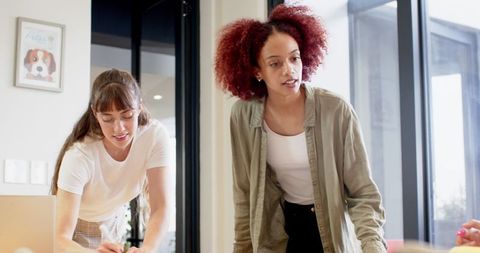 Diverse Creative Team Collaborating in Minimalist Office Space