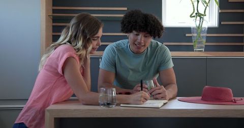Smiling couple enjoying relaxed moments at home