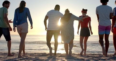 Diverse Group of Friends Watching Sunset on Beach Vacation - Download Free Stock Images Pikwizard.com