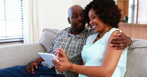 Happy African American Couple Enjoying Tablet Together Indoors - Download Free Stock Images Pikwizard.com