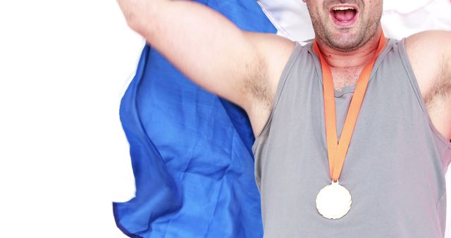 Man Celebrating Victory with Gold Medal and Flag - Download Free Stock Images Pikwizard.com