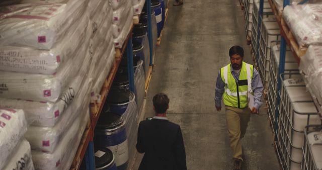 Two Men Working in Warehouse, Freight Management, and Logistics Operations - Download Free Stock Images Pikwizard.com