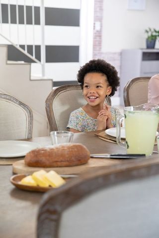 Joyful Family Breakfast in Cozy Home Dining Room Setting