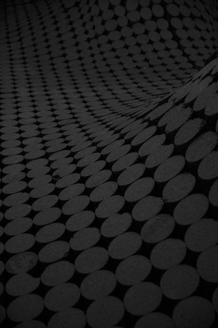 Abstract Black Perforated Metal Surface with Circular Patterns - Download Free Stock Photos Pikwizard.com