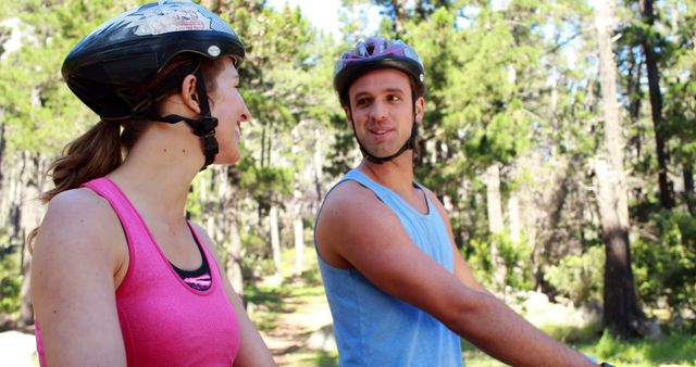 Couple Enjoying Outdoor Mountain Biking Together in Forest - Download Free Stock Images Pikwizard.com