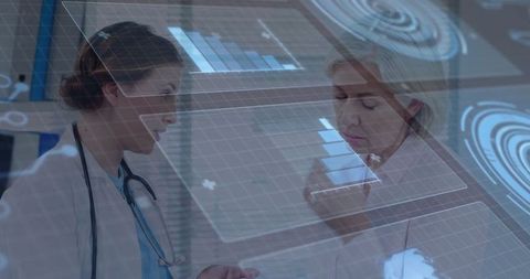 Female Doctors Engaging with Futuristic Holographic Medical Technology